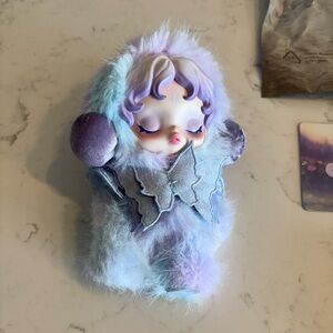 Plush Pastel Doll with Purple Accents